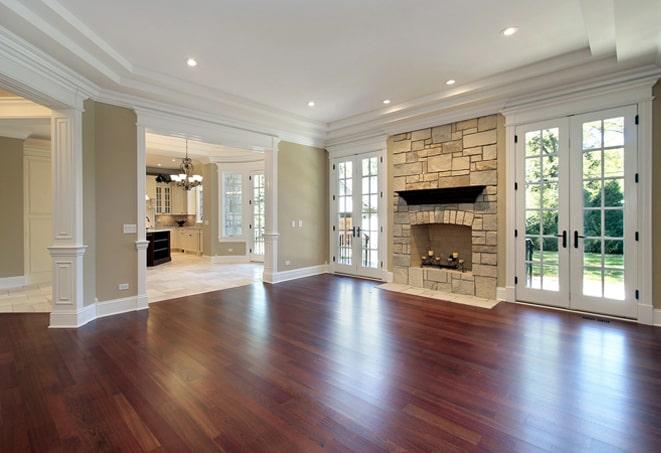 sunlit bedroom with elegant wood floors